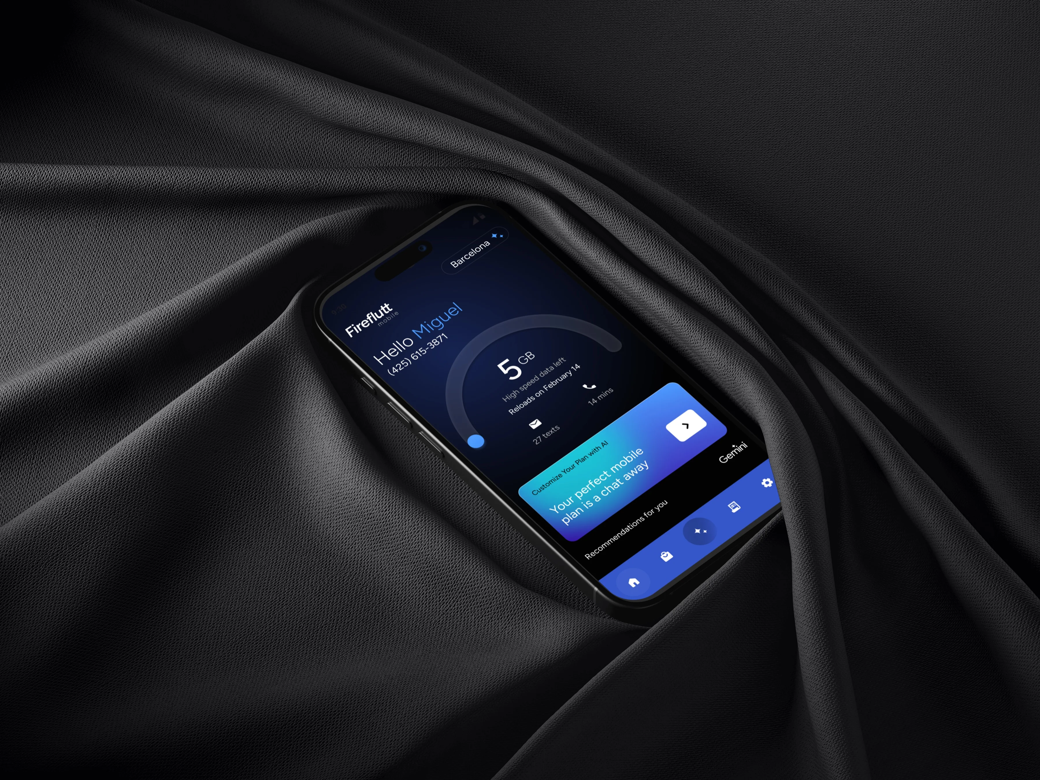 The redesigned Fireflut home screen on an iPhone resting on dark fabric — the Gemini-powered telecom assistant showing data usage, plan details, and AI recommendations